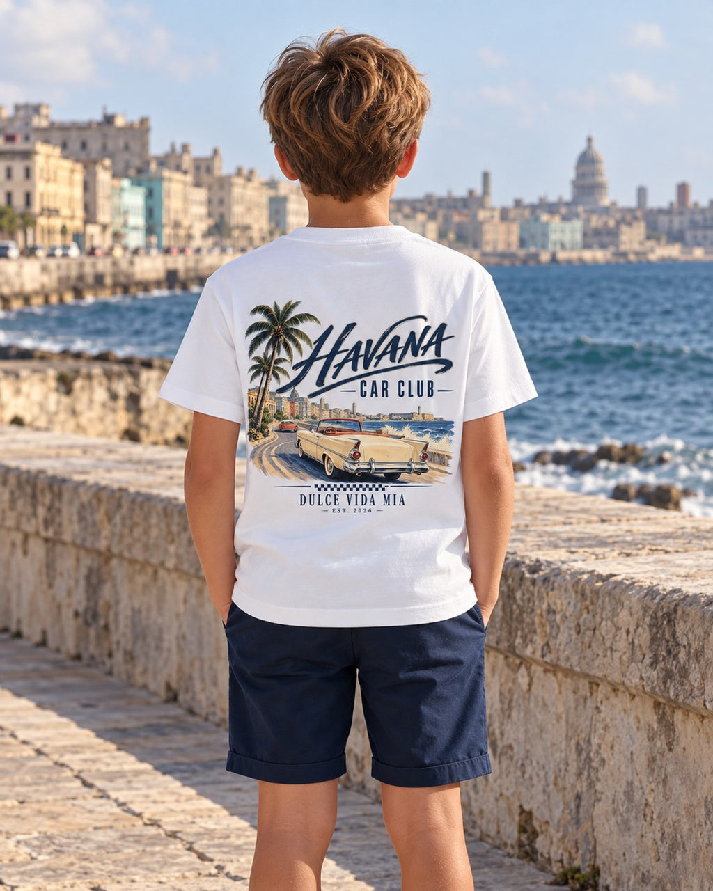 Boy modeling Kids Havana Coastal Drive Back Print Tee in classic coastal styling