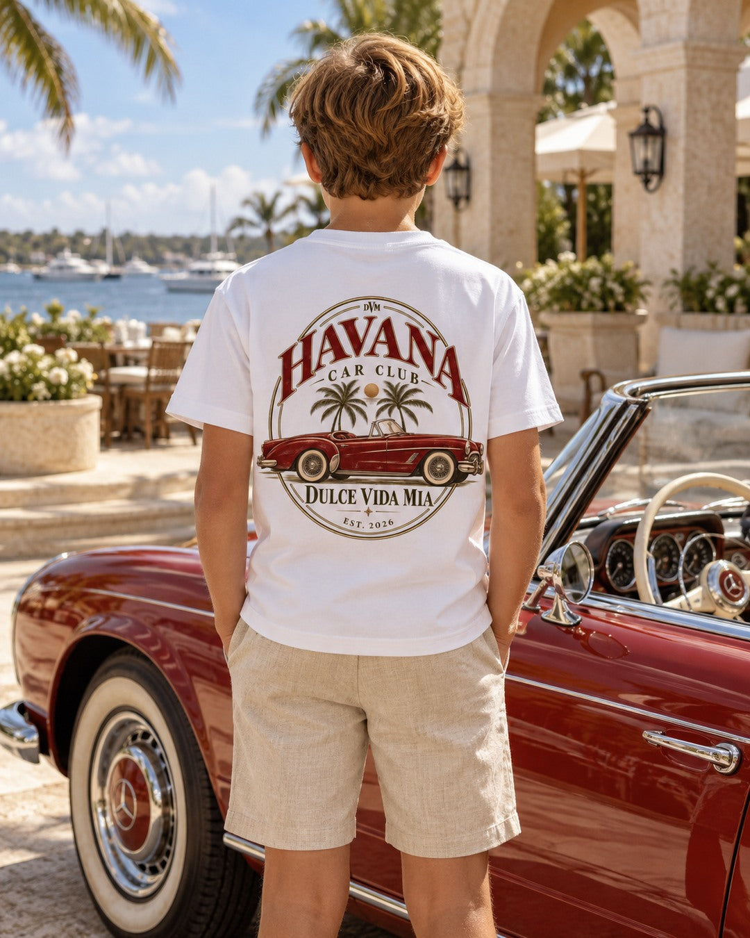 Boy modeling Kids Havana Grand Touring Back Print Tee in classic coastal styling