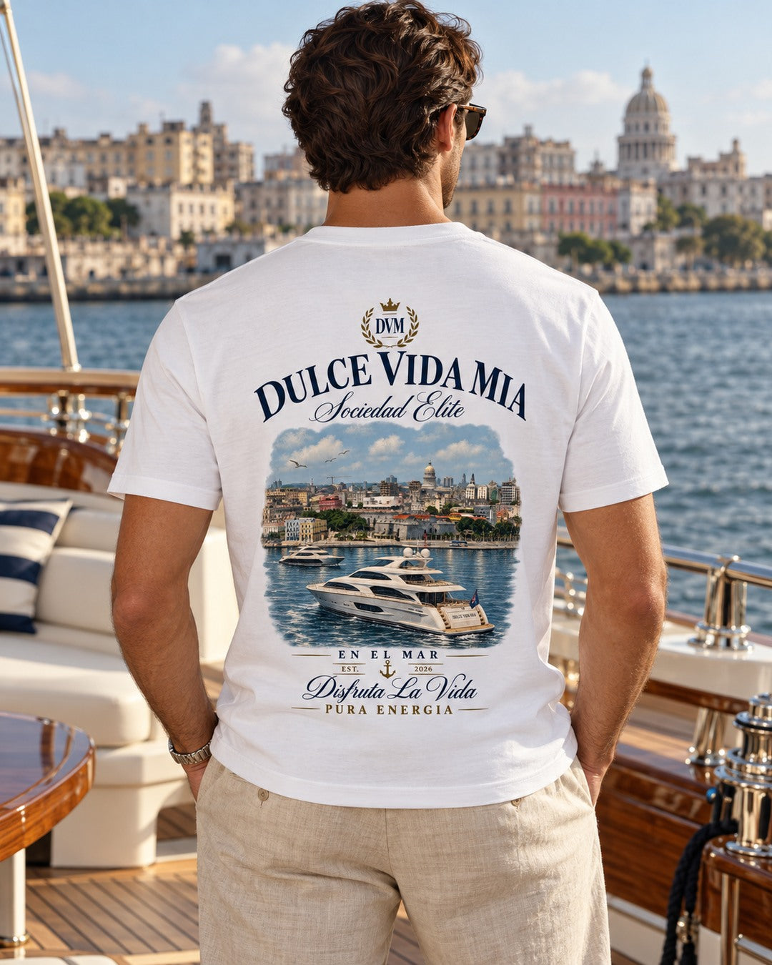 Imperio DVM white tee with full Havana yacht back print styled on a yacht with khaki linen trousers
