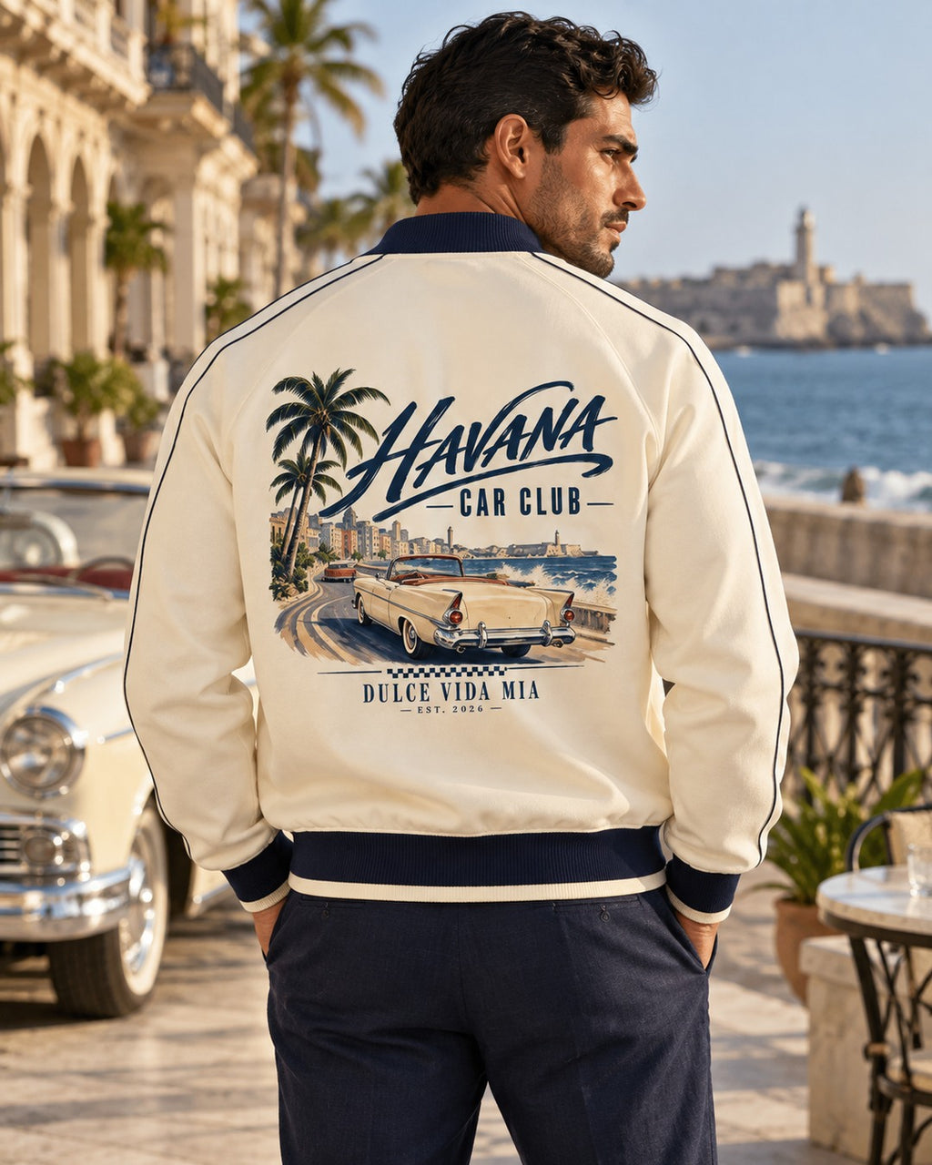 Cream and navy Havana Car Club raglan jacket with large back artwork on an athletic male model