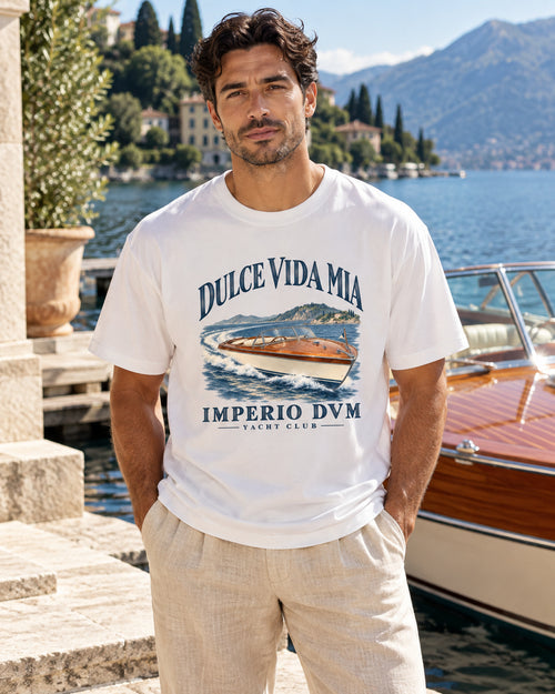 Imperio DVM Classic Runabout white graphic tee — realistic resort-style male model mockup